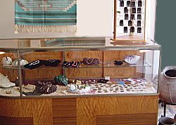Jewelry case at Greene's Books & Beans, 140 Bank Street, New London featuring locally crafted sterling silver and gmstone jewelry